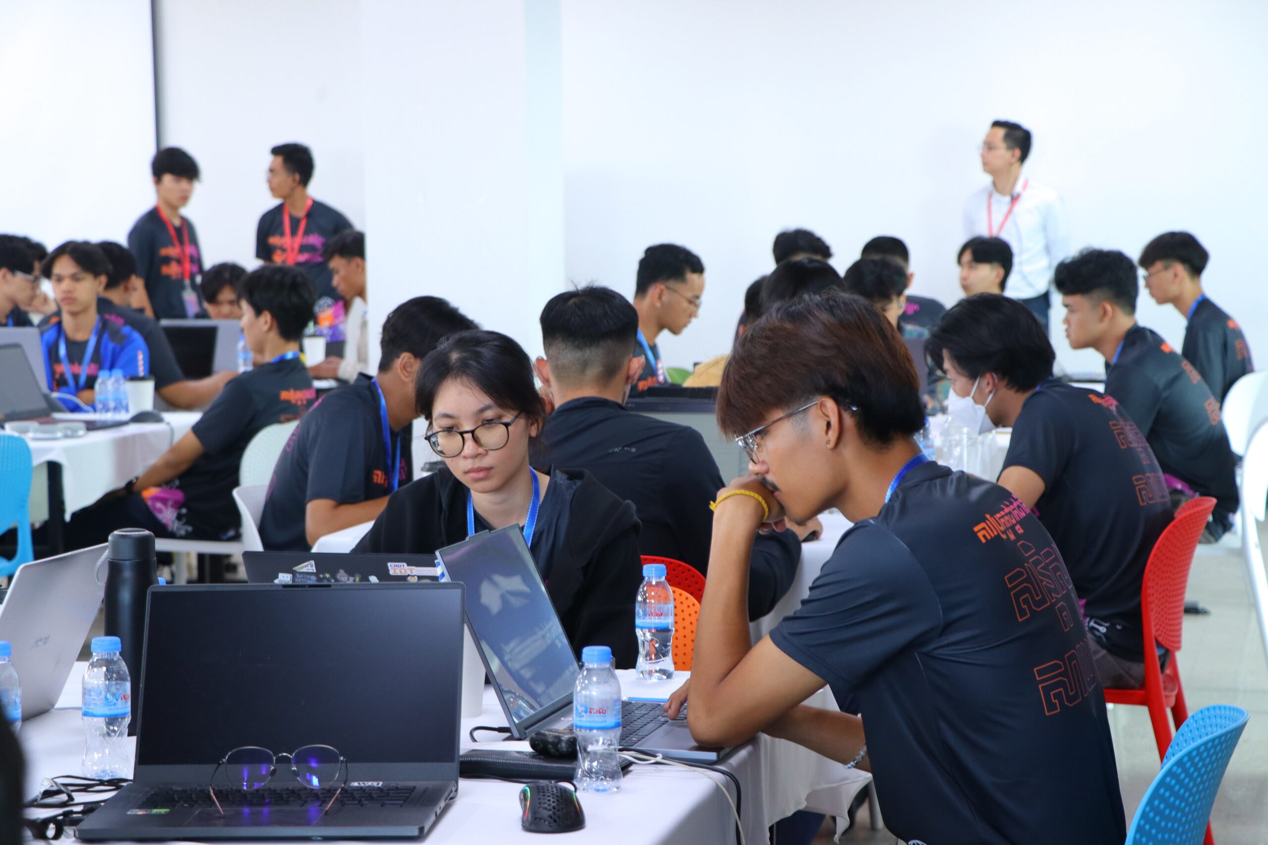 Participants working on cybersecurity challenges during CNCC
